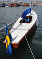 Rush V, 5 m. Designer Einar Olsson. Rush V was built by Lasse Thörn, who won by this boat the Scandinavian Gold Cup in 1959, and World Championship and Olympic gold medal in 1959