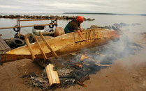 Haapion valmistus Käsmun kylässä Eestissä - Construction of a one-log-canoe by heating and carefull spreading in Northern Estonia. The log is traditionally aspen