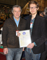 Esko ja Jani Vahto kunniakirjan satuaan.
The owners have received the K-certificate