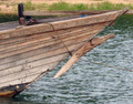 Bow of the boat, look at wood carwings on the upper board