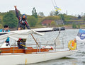 Universal Rule 7,5 m yacht Lea-Berenice, constructed by Åbo Båtvarf in the year 1908. Now in Estonia, totally restored at Kärdla boatyard. The owner and skipper Boris Ljubtshenko shows optimistically winners hand signal.